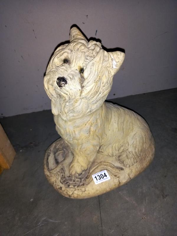 A stone Yorkshire Terrier garden statue. COLLECT ONLY.