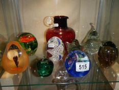 A good lot of glass paperweights.