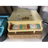 A vintage boxed childs piano