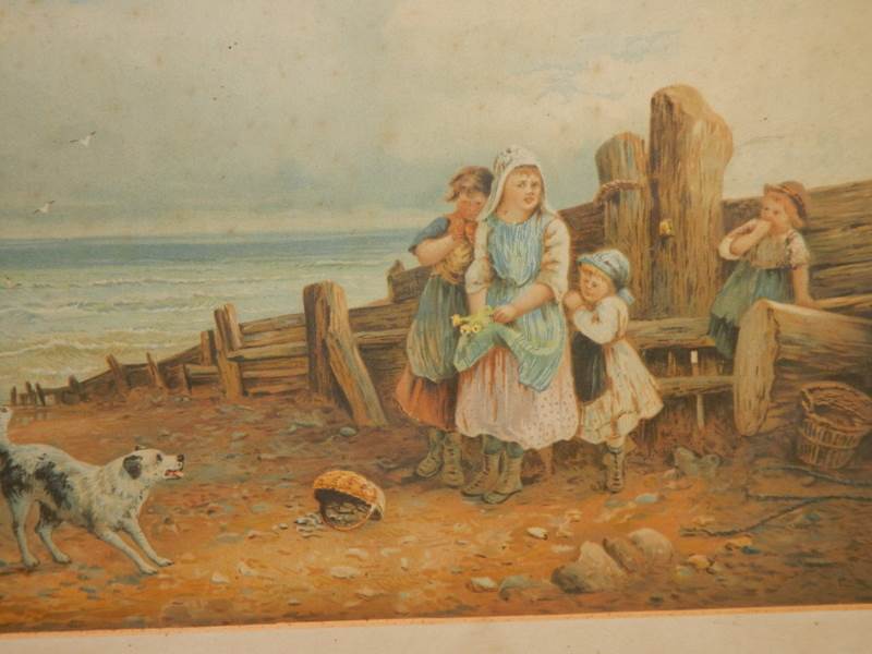 An early 20th century framed and glazed print featuring children on a beach, 88 x 65 cm. - Image 2 of 3