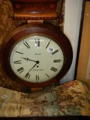 A Fusee Wall clock, 16.5" diameter mahogany case, dome glass, with key & pendelum, in working order