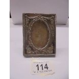 An Adam style silver photo frame, 9 x 7 cm.