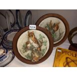 A pair of signed Italian porcelain with wood back plaques depicting birds