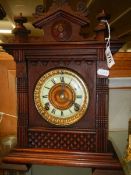 A mahogany eight day mantel clock.