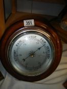 An aneroid barometer.