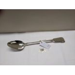 An early 19th century fiddle pattern white metal serving spoon, marks indistinct. 156 grams.