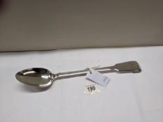 An early 19th century fiddle pattern white metal serving spoon, marks indistinct. 156 grams.