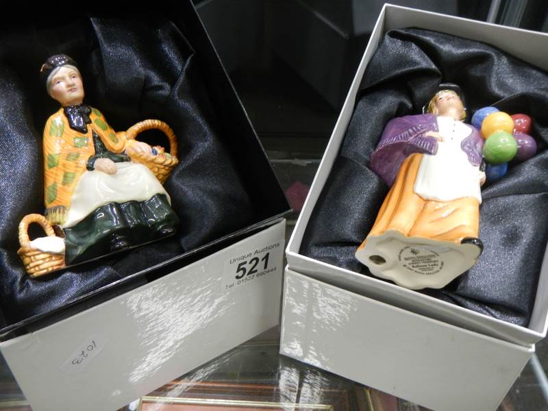 Two boxed Royal Doulton figurines.