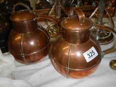 A pair of copper lidded pots by E W Bachman, Guernsey.