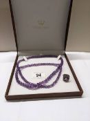 A long natural amethyst necklace and an amethyst ring circa 1970's in a heavy textured mount.
