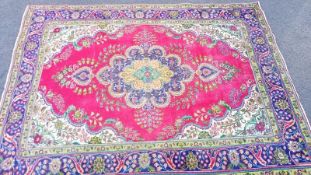 A multicoloured rug - 327cm x 295cm? (COLLECT ONLY)