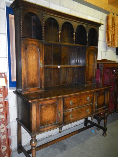 An early 20th century oak dresser.