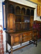 An early 20th century oak dresser.