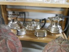 A five piece silver plate tea set.