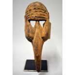 An African Dogon bird mask, 42cm tall