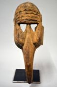 An African Dogon bird mask, 42cm tall