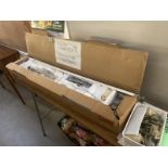 A boxed Brother knitting machine with accessories, manuals & folding table (model KR-850)