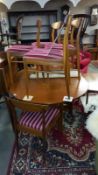 A 1970's teak dining table & 6 chairs COLLECT ONLY.