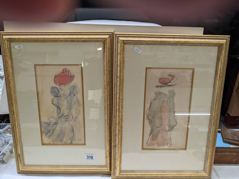 A pair of framed and glazed fashion studies.