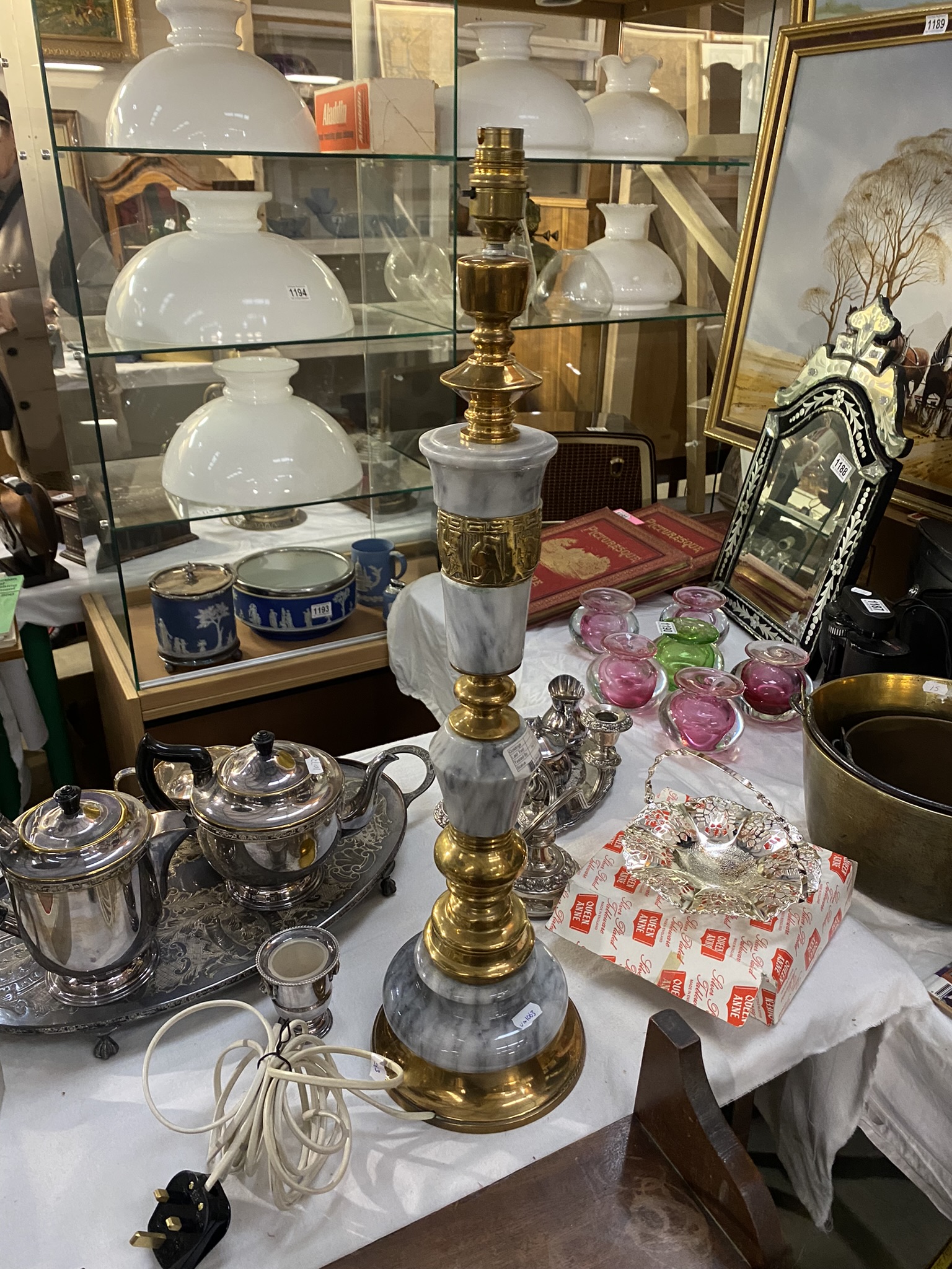 An ornate smokey marble & brass table lamp - height 66cm