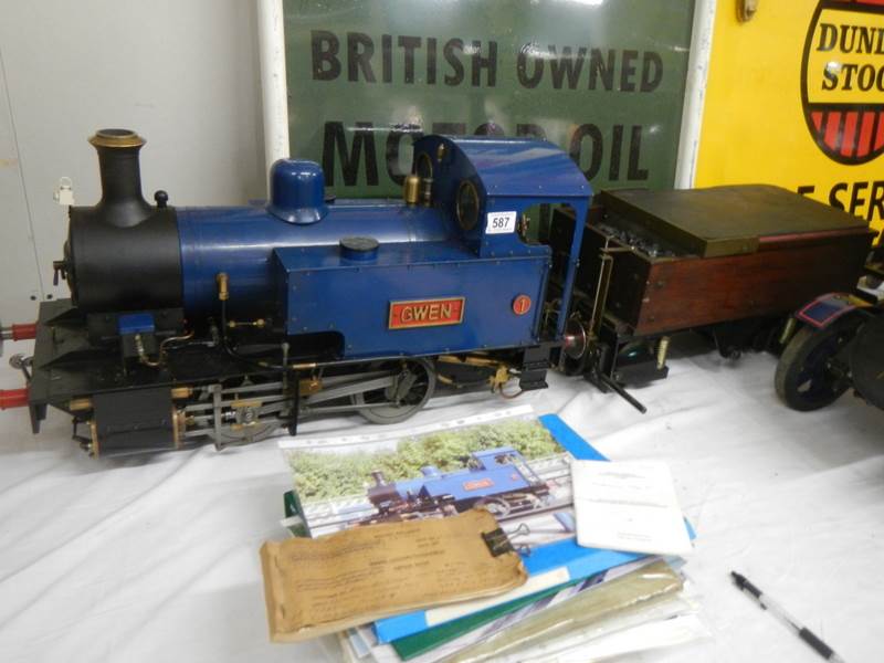 A scratch built steam engine 'GWEN' with a coal trailer.