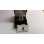 A 9ct gold ring set amber coloured stone, size S half, 3.1 grams.