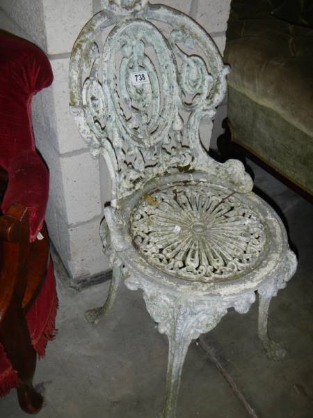 An old cast metal garden seat. - Image 2 of 2