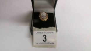 A 14kt gold ring set rose cut cameo, size R half, 3.6 grams.