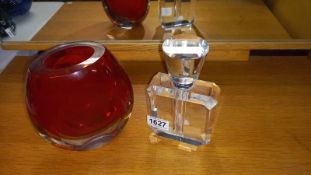 A large heavy bevel glass perfume/scent bottle, small chips to top, also dipstick missing, Height