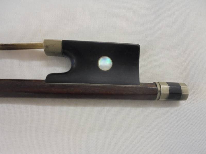 A 19th century violin bow by GEBR.HUG, 74 cm long. - Image 5 of 7