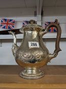 An unusual silver plate coffee pot the dragon spout.