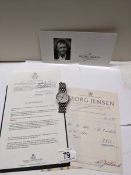 A Georg Jensen automatic gents wrist watch with receipt and guarantee, dated 1995 in German.
