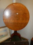 A period oak circular tip top tripid table. COLLECT ONLY