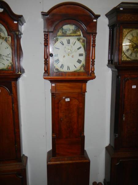 A good 8 day painted dial Long case clock, in working order.