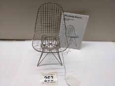 A Vitra Design Museum 1/6 scale Charles R Ray games model wire chair.