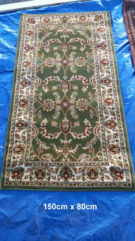 A green patterned rug - 150cm x 80cm & 1 other rug - 90cm x 165cm (COLLECT ONLY) - Image 2 of 6