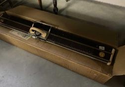 A vintage boxed Knitmaster knitting machine