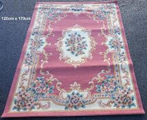 A pink patterned rug - 120cm x 170cm (COLLECT ONLY)