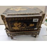 An early Japanese lacquered box on stand, a/f (has had some restoration but needs more).