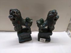 An early pair of Chinese Dogs of Fo, 13 cm wide, 7cm deep, 23 cm high.