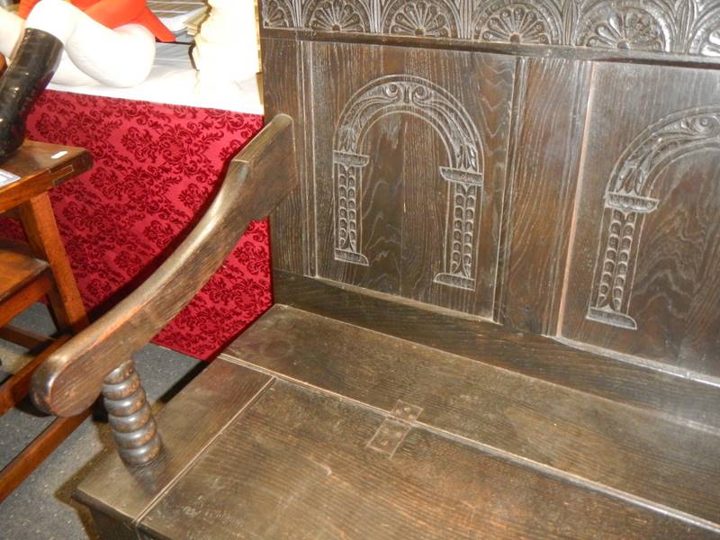 A Victorian carved oak monk's bench. - Image 2 of 4