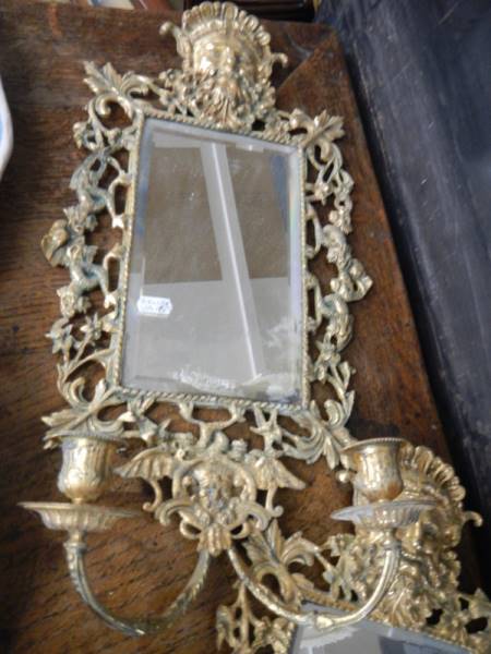 A pair of gilt metal vintage candle sconces with bevelled mirrors, with Bacchus head & ornate - Image 2 of 4