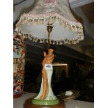 A good table lamp featuring a dancing lady.