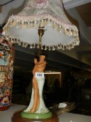 A good table lamp featuring a dancing lady.