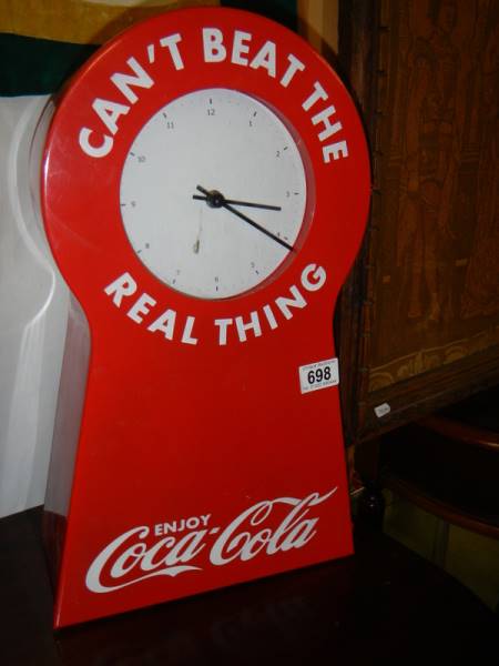 A Coca Cola clock.