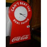 A Coca Cola clock.