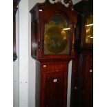 A good eight day long case clock with brass arched dial