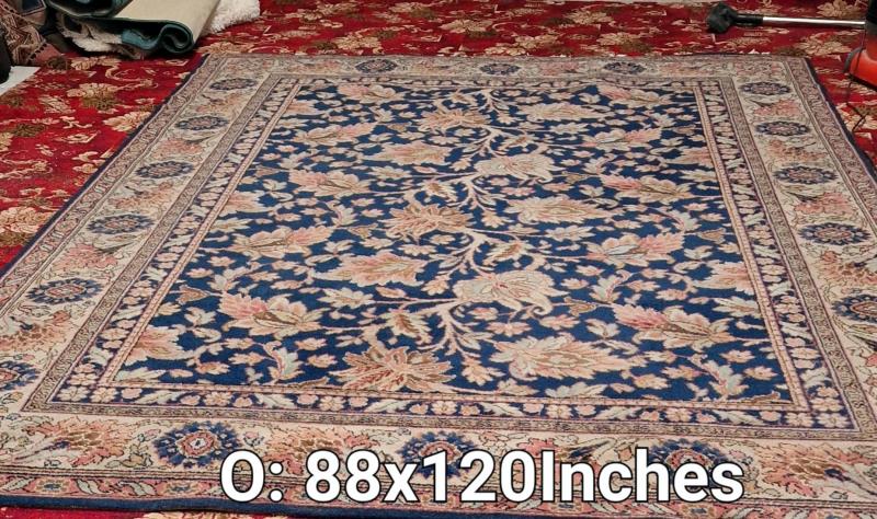 A blue/brown patterned rug - 0.88 inches x 120 inches (COLLECT ONLY)