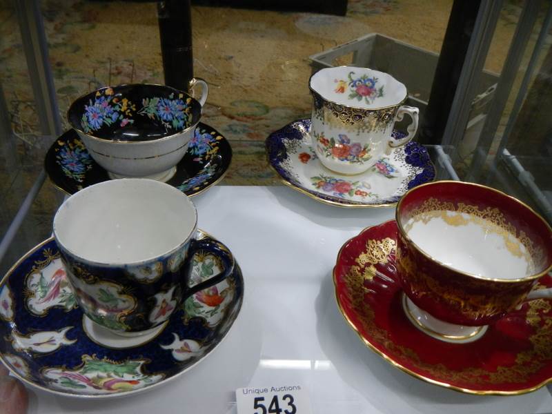 Four fine china tea cups and saucers including Aynsley.