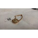 A 9ct gold vintage ladies wrist watch, total weight 14.8 grams.